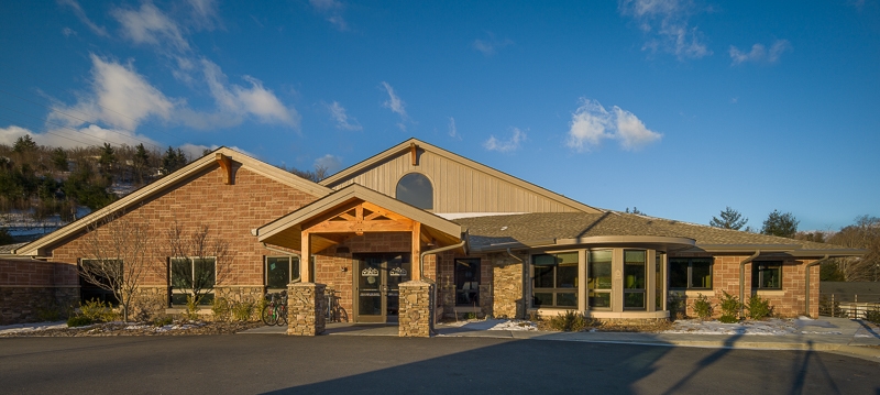 Commercial timber frame entry at Hospitality House Boone NC