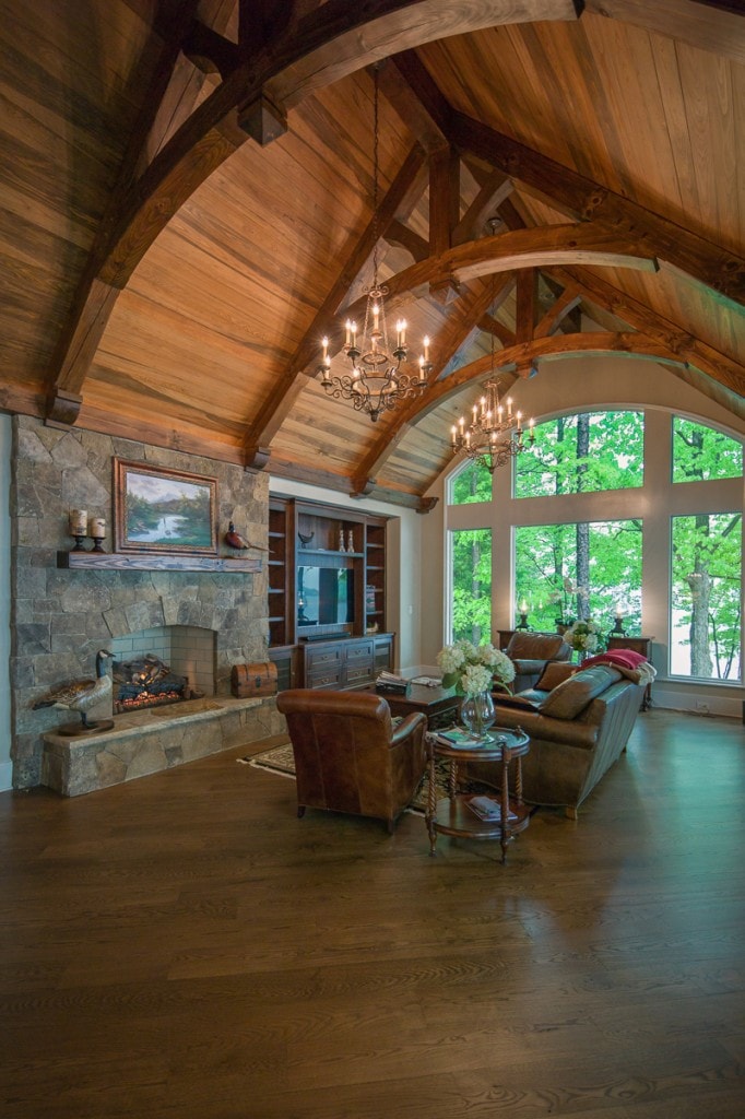curved king post timber frame trusses in great room