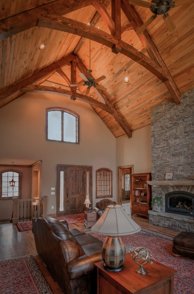 decorative timber frame king post trusses with curved lower member