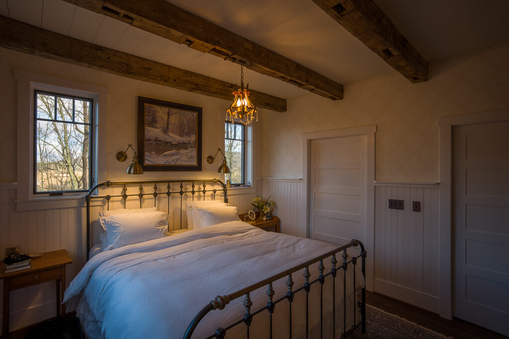 reclaimed beams in bedroom