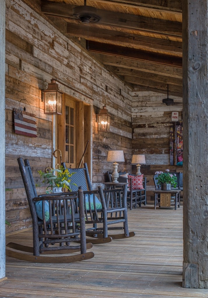 timber frame front porch on the New River with reclaimed wood wall and beams
